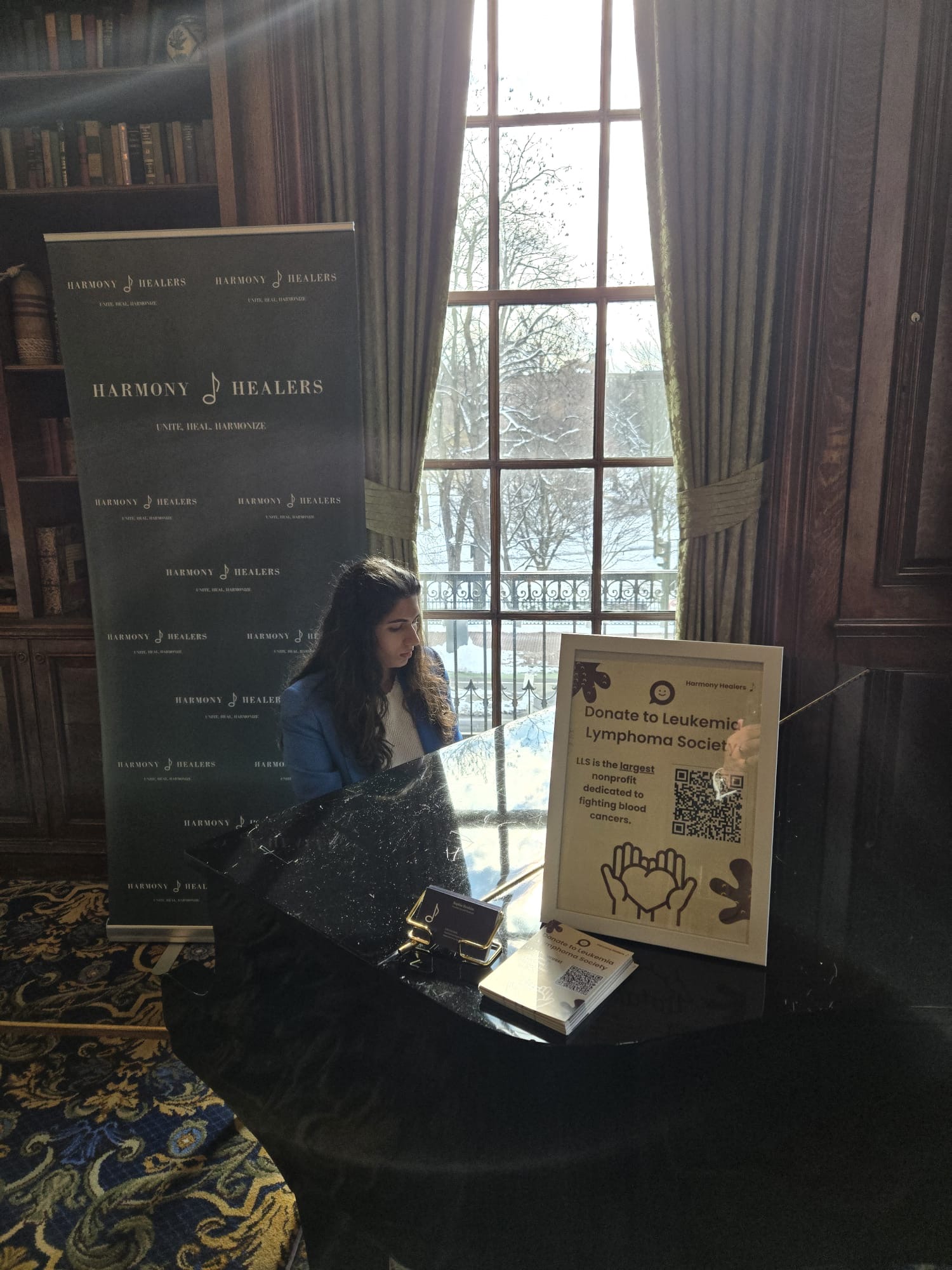 Sophia playing piano at a Leukemia & Lymphoma Society fundraising event